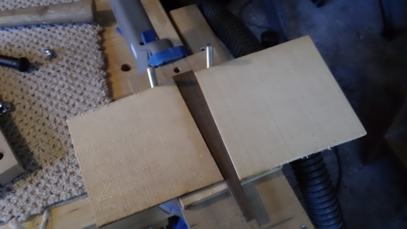 When dry, take off the upper clamps and glue in your end wedge.