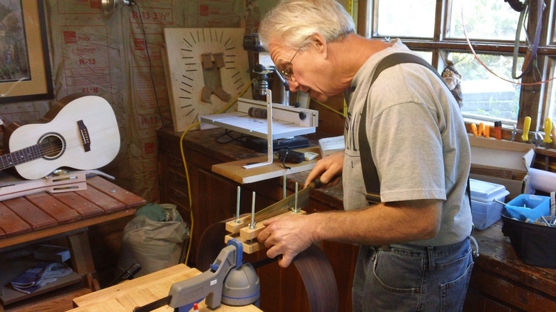 Cutting the end wedge slot, at the same time gluing the rim to the block.<br />Yes that is a Gnome watching over things - he (gnome) knows a million jokes so I keep him around.