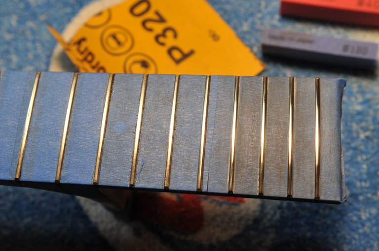 While the lacquer on the body is curing it gives me a chance to dress the frets.