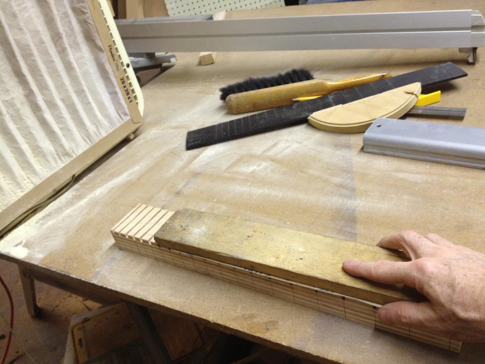 Here I'm sanding the 16&quot; radius onto the newly slotted caul.