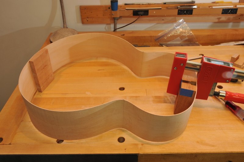 Gluing the neck block and tail block.